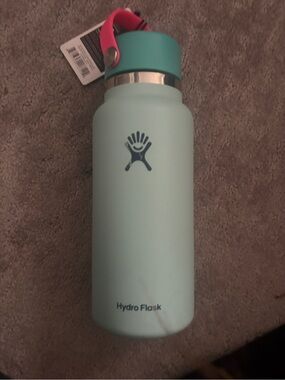 Hydro Flask Mint Green Bottle with Teal Cap and Pink Strap